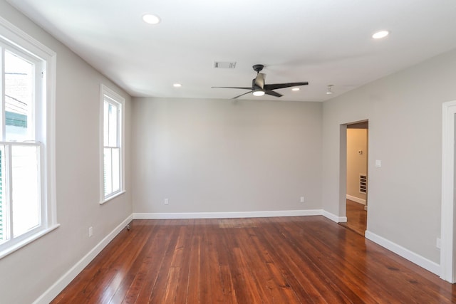 3128 Avenue N, Galveston, TX 77550 - empty room featuring a ceiling fan, dark wood-type flooring, and recessed lighting
