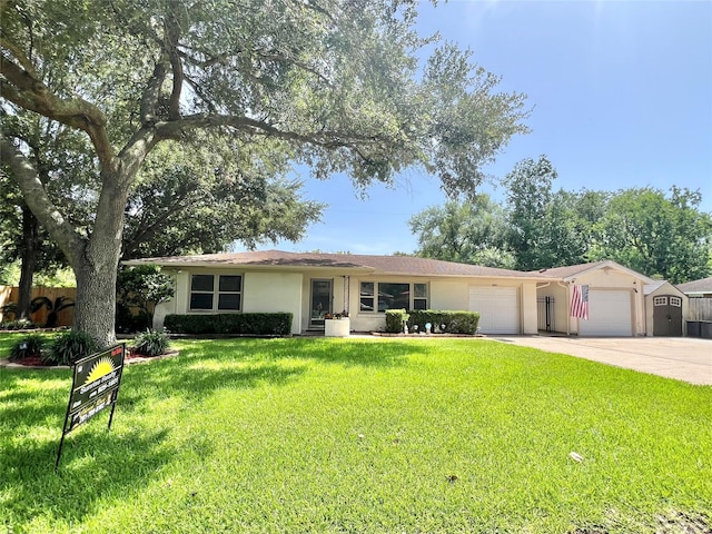 8009 Dellanera Dr, Hitchcock, TX 77563 - ranch-style home with a garage, driveway, and stucco siding