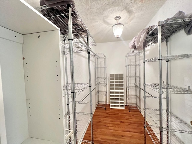 8009 Dellanera Dr, Hitchcock, TX 77563 - spacious closet featuring wood finished floors