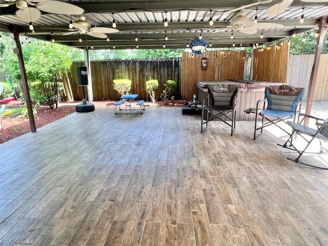 8009 Dellanera Dr, Hitchcock, TX 77563 - view of patio / terrace with a ceiling fan and a hot tub