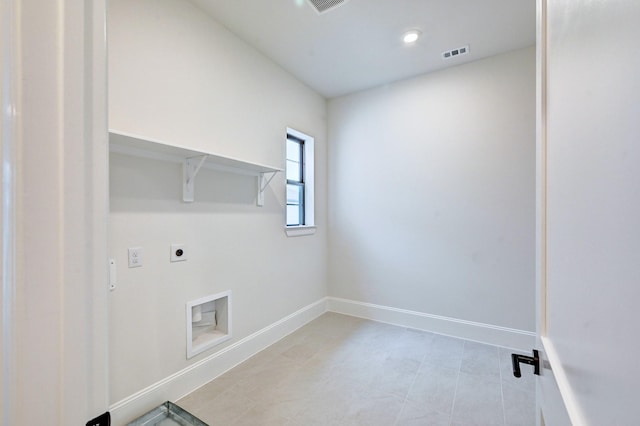 12008 Royal Oaks Banner Way, Houston, TX 77082 - laundry room featuring hookup for an electric dryer and light tile patterned floors