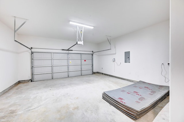 12008 Royal Oaks Banner Way, Houston, TX 77082 - garage featuring electric panel and a garage door opener