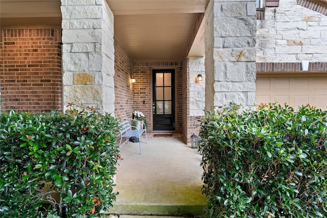 1942 Elkington Cir, Conroe, TX 77304 - entrance to property featuring a porch, brick siding, and stone siding