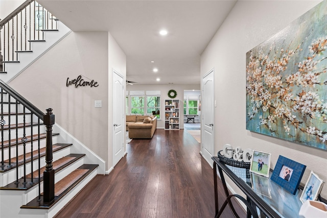 1942 Elkington Cir, Conroe, TX 77304 - corridor with wood finished floors, stairway, and recessed lighting