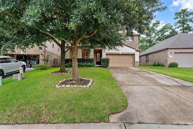 1942 Elkington Cir, Conroe, TX 77304 - obstructed view of property featuring brick siding, a front yard, and concrete driveway