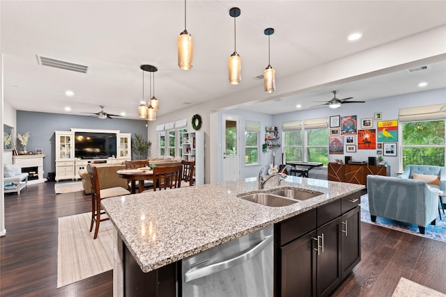 1942 Elkington Cir, Conroe, TX 77304 - kitchen with open floor plan, dishwasher, a ceiling fan, plenty of natural light, and recessed lighting