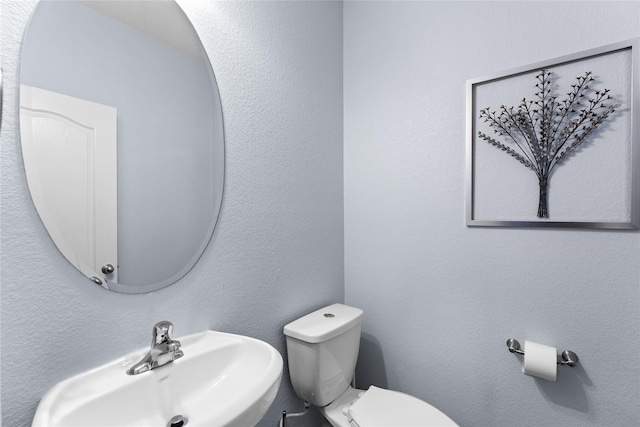 1942 Elkington Cir, Conroe, TX 77304 - bathroom with a sink and toilet