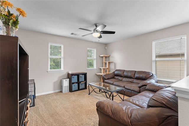 1942 Elkington Cir, Conroe, TX 77304 - living room with a ceiling fan and carpet flooring