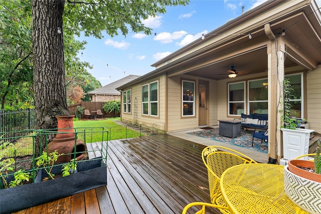 1942 Elkington Cir, Conroe, TX 77304 - deck featuring a fenced backyard and ceiling fan
