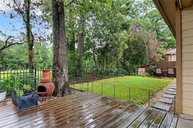 1942 Elkington Cir, Conroe, TX 77304 - wooden deck with a fenced backyard