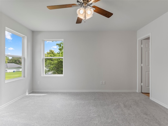 304 N Orange St, Sweeny, TX 77480 - carpeted spare room with ceiling fan and baseboards