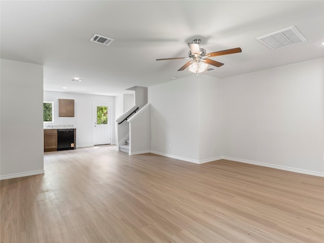 304 N Orange St, Sweeny, TX 77480 - unfurnished living room with stairway, a ceiling fan, light wood-type flooring, and recessed lighting