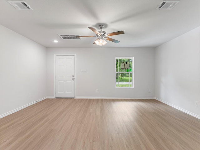 304 N Orange St, Sweeny, TX 77480 - unfurnished room with a ceiling fan, light wood-type flooring, and recessed lighting