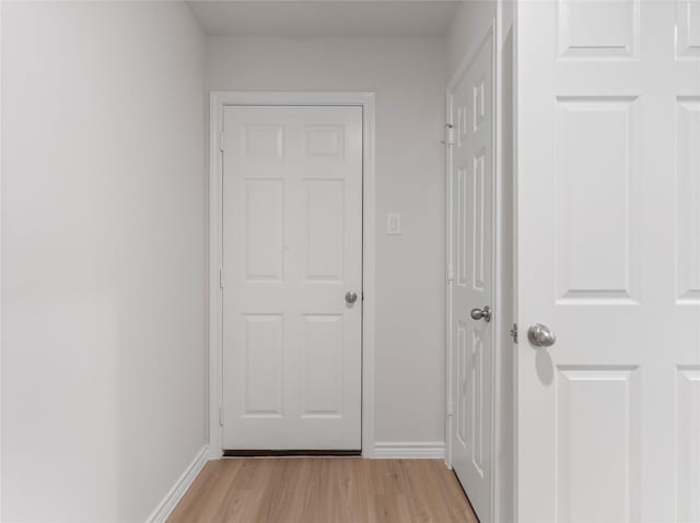 304 N Orange St, Sweeny, TX 77480 - corridor with light wood finished floors and baseboards