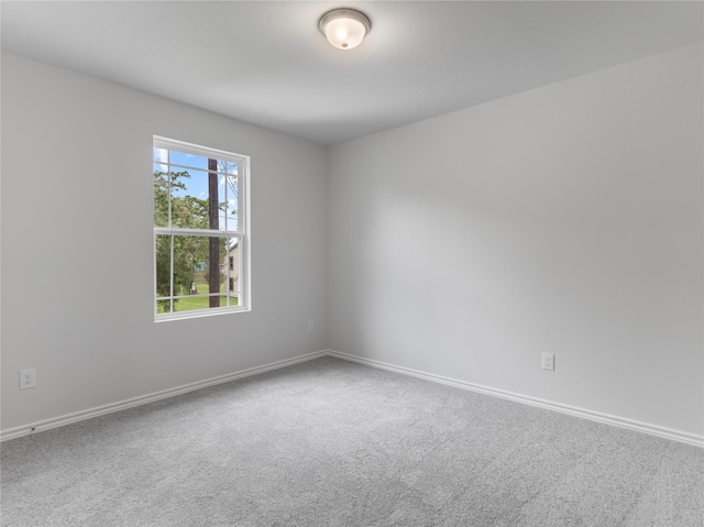 304 N Orange St, Sweeny, TX 77480 - carpeted empty room featuring baseboards
