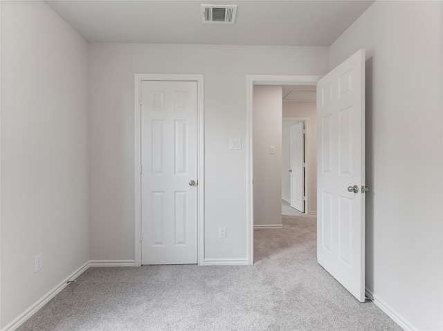 304 N Orange St, Sweeny, TX 77480 - unfurnished bedroom with carpet floors and baseboards