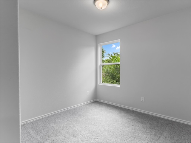 304 N Orange St, Sweeny, TX 77480 - carpeted spare room featuring baseboards
