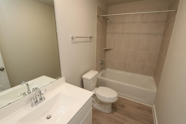 4989 Perennial Ln, La Marque, TX 77568 - bathroom featuring wood finished floors, bathtub / shower combination, and vanity