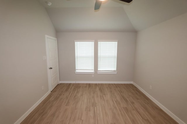 4989 Perennial Ln, La Marque, TX 77568 - spare room with vaulted ceiling, wood finished floors, ceiling fan, and a smoke detector