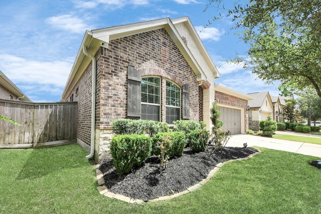 9430 Jayci Hills Ln, Cypress, TX 77433 - view of side of home with brick siding, driveway, and a lawn