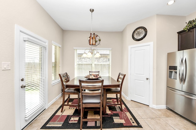 9430 Jayci Hills Ln, Cypress, TX 77433 - dining area featuring light tile patterned flooring, a chandelier, plenty of natural light, and recessed lighting