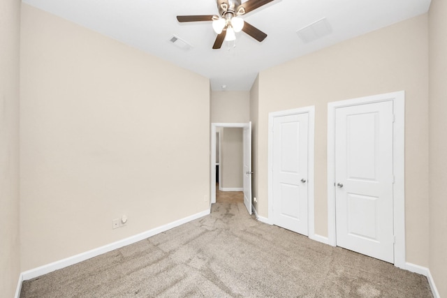 9430 Jayci Hills Ln, Cypress, TX 77433 - unfurnished bedroom featuring carpet floors and a ceiling fan