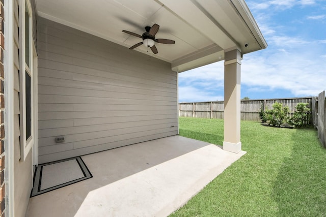 9430 Jayci Hills Ln, Cypress, TX 77433 - fenced backyard with a ceiling fan and a patio
