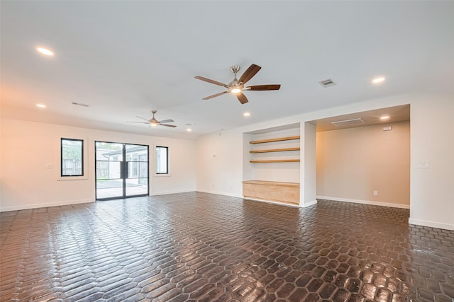 6206 San Felipe St, Houston, TX 77057 - spare room featuring ceiling fan, recessed lighting, and stone finish flooring