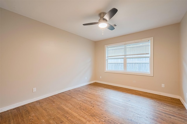 6206 San Felipe St, Houston, TX 77057 - unfurnished room featuring wood finished floors and a ceiling fan