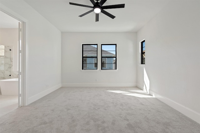 3223 Royal Oaks Hollow Ln, Houston, TX 77082 - unfurnished bedroom featuring carpet flooring, connected bathroom, and a ceiling fan