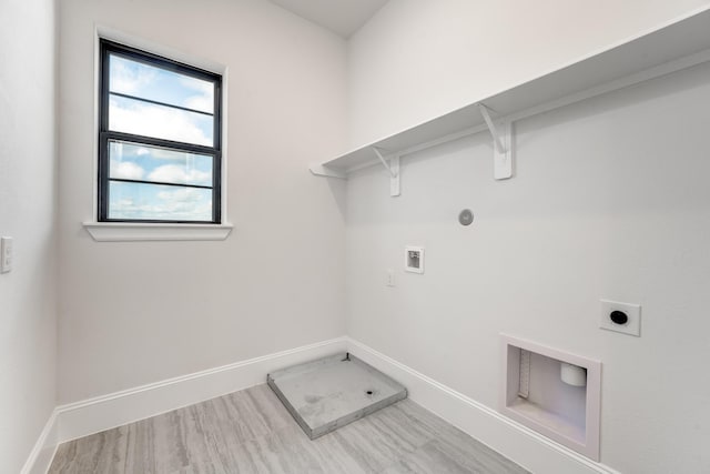 3223 Royal Oaks Hollow Ln, Houston, TX 77082 - laundry room featuring electric dryer hookup, washer hookup, and hookup for a gas dryer