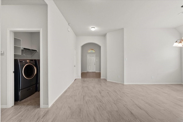 621 Rocky Hollow Ln, League City, TX 77573 - unfurnished room with washer / clothes dryer and arched walkways