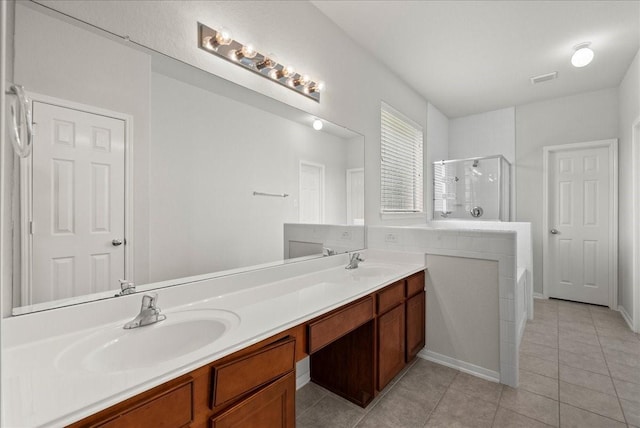 621 Rocky Hollow Ln, League City, TX 77573 - full bathroom with a shower stall, tile patterned floors, and double vanity
