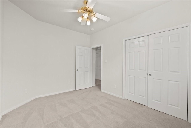 621 Rocky Hollow Ln, League City, TX 77573 - unfurnished bedroom with light colored carpet, a closet, and ceiling fan