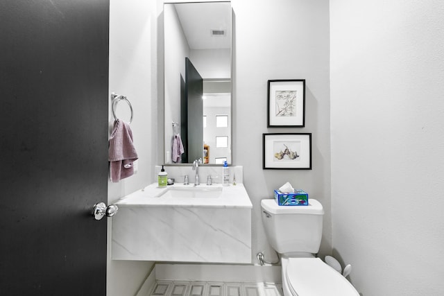 1807 Dart St, Houston, TX 77007 - half bathroom with toilet and vanity