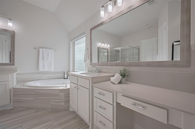 2430 Sunflower Cove Ln, Brookshire, TX 77423 - full bathroom with vanity, a bath, a stall shower, and lofted ceiling