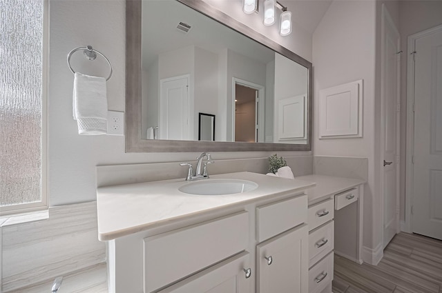 2430 Sunflower Cove Ln, Brookshire, TX 77423 - bathroom with vanity and wood finished floors