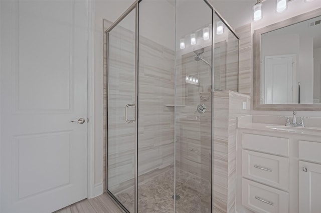 2430 Sunflower Cove Ln, Brookshire, TX 77423 - bathroom with a shower stall and vanity