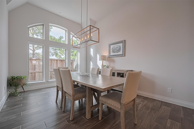 2430 Sunflower Cove Ln, Brookshire, TX 77423 - dining area with plenty of natural light, dark wood finished floors, a chandelier, and high vaulted ceiling