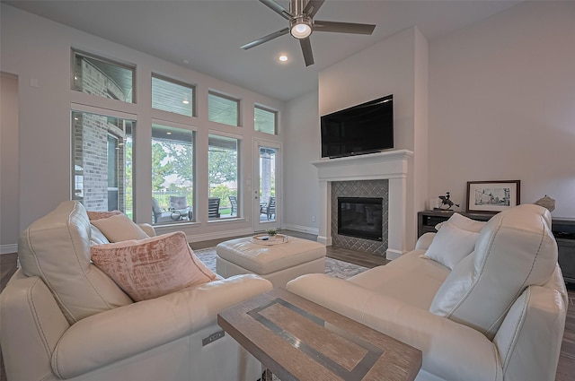 2430 Sunflower Cove Ln, Brookshire, TX 77423 - living area featuring ceiling fan, a fireplace, a high ceiling, recessed lighting, and wood finished floors