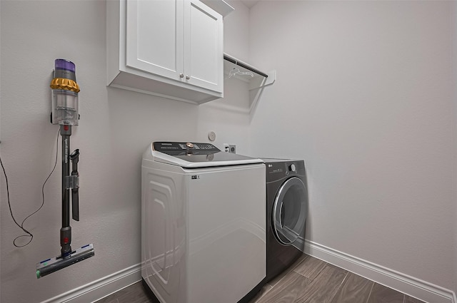 2430 Sunflower Cove Ln, Brookshire, TX 77423 - washroom with cabinet space and separate washer and dryer