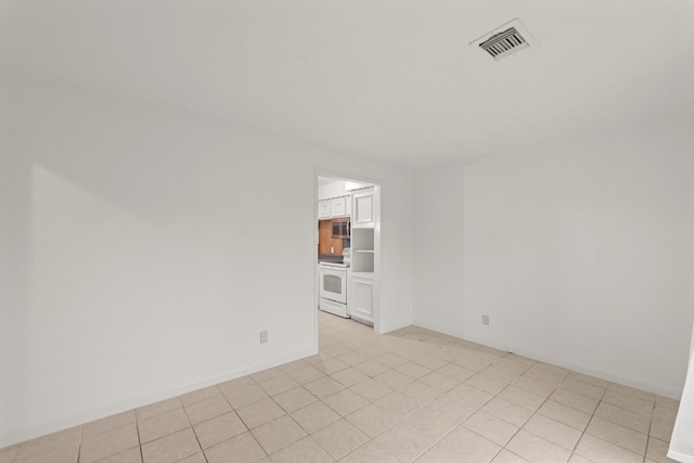 746 Fawn Dr, Houston, TX 77015 - empty room with light tile patterned floors