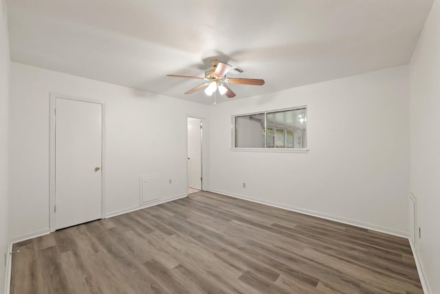 746 Fawn Dr, Houston, TX 77015 - unfurnished bedroom featuring wood finished floors and ceiling fan