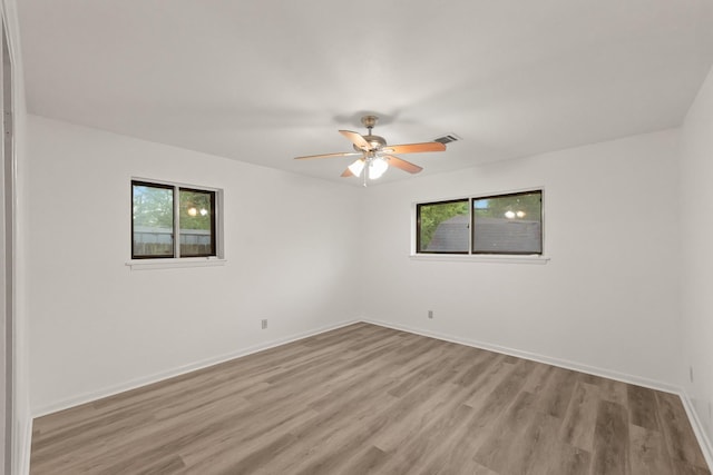 746 Fawn Dr, Houston, TX 77015 - spare room featuring plenty of natural light, wood finished floors, and ceiling fan