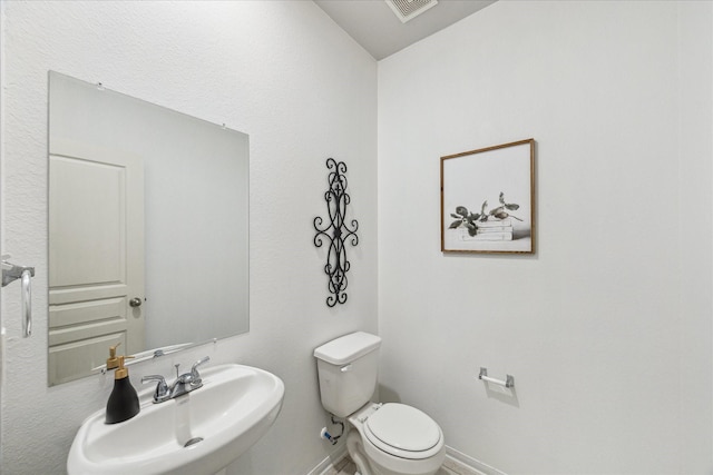 1516 Foshee Ct, Alvin, TX 77511 - half bathroom with a sink and toilet