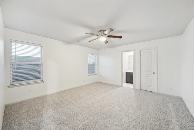 1516 Foshee Ct, Alvin, TX 77511 - spare room with a ceiling fan and light colored carpet