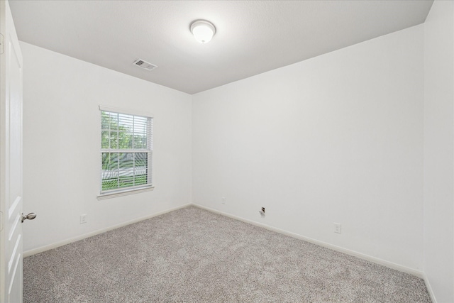 1516 Foshee Ct, Alvin, TX 77511 - empty room featuring carpet floors and baseboards
