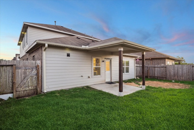 1516 Foshee Ct, Alvin, TX 77511 - back of house featuring a patio area, a fenced backyard, and a shingled roof