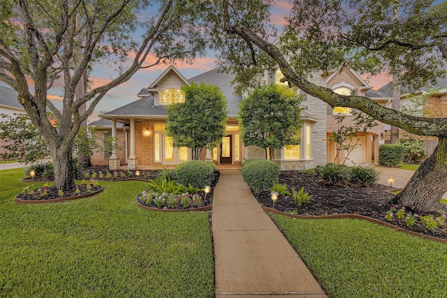 14015 Halprin Creek Dr, Cypress, TX 77429 - view of front of home with a front yard, driveway, brick siding, and an attached garage