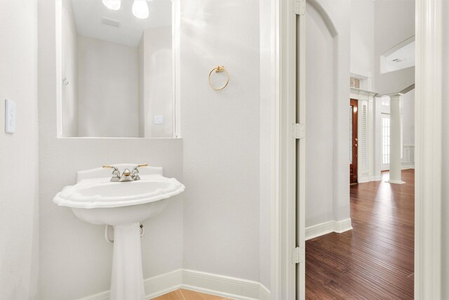 14015 Halprin Creek Dr, Cypress, TX 77429 - bathroom featuring ornate columns and wood finished floors